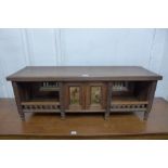 A Victorian Aesthetic Movement desk top cabinet, 41cms h x 119cms w