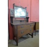 An Arts and Crafts Shapland & Petter mahogany dressing table