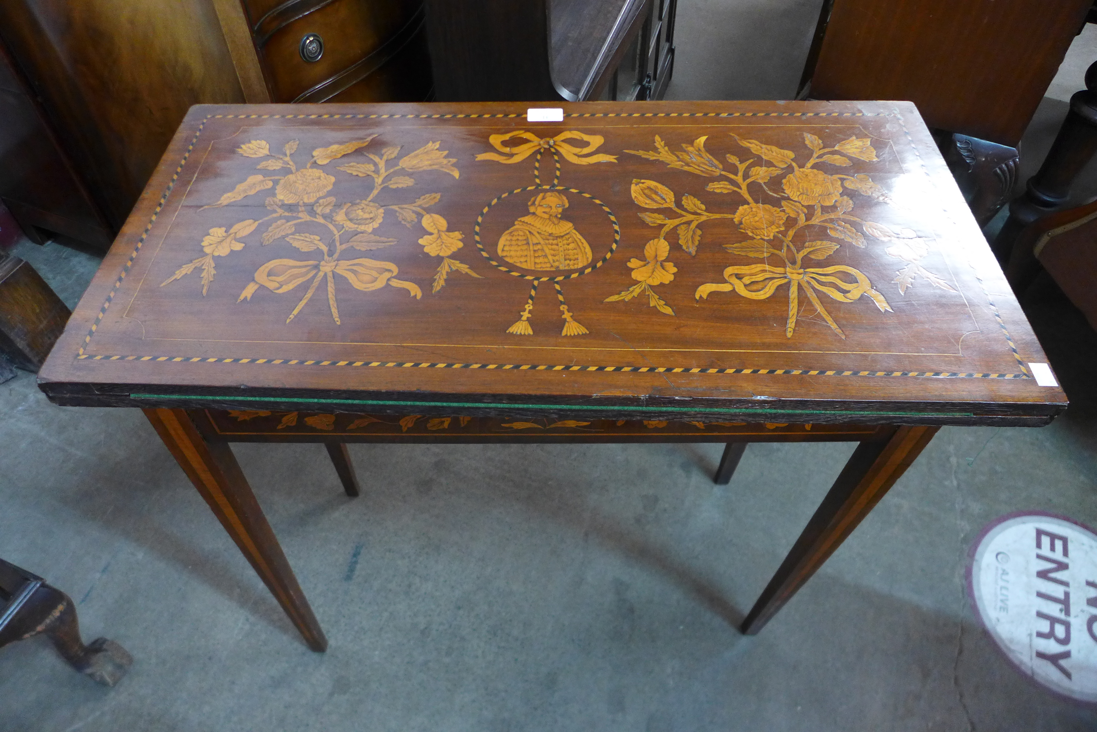 An 18th Century Dutch rosewood and marquetry inlaid card table