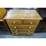 A pine chest of drawers