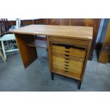 A teak fitted desk