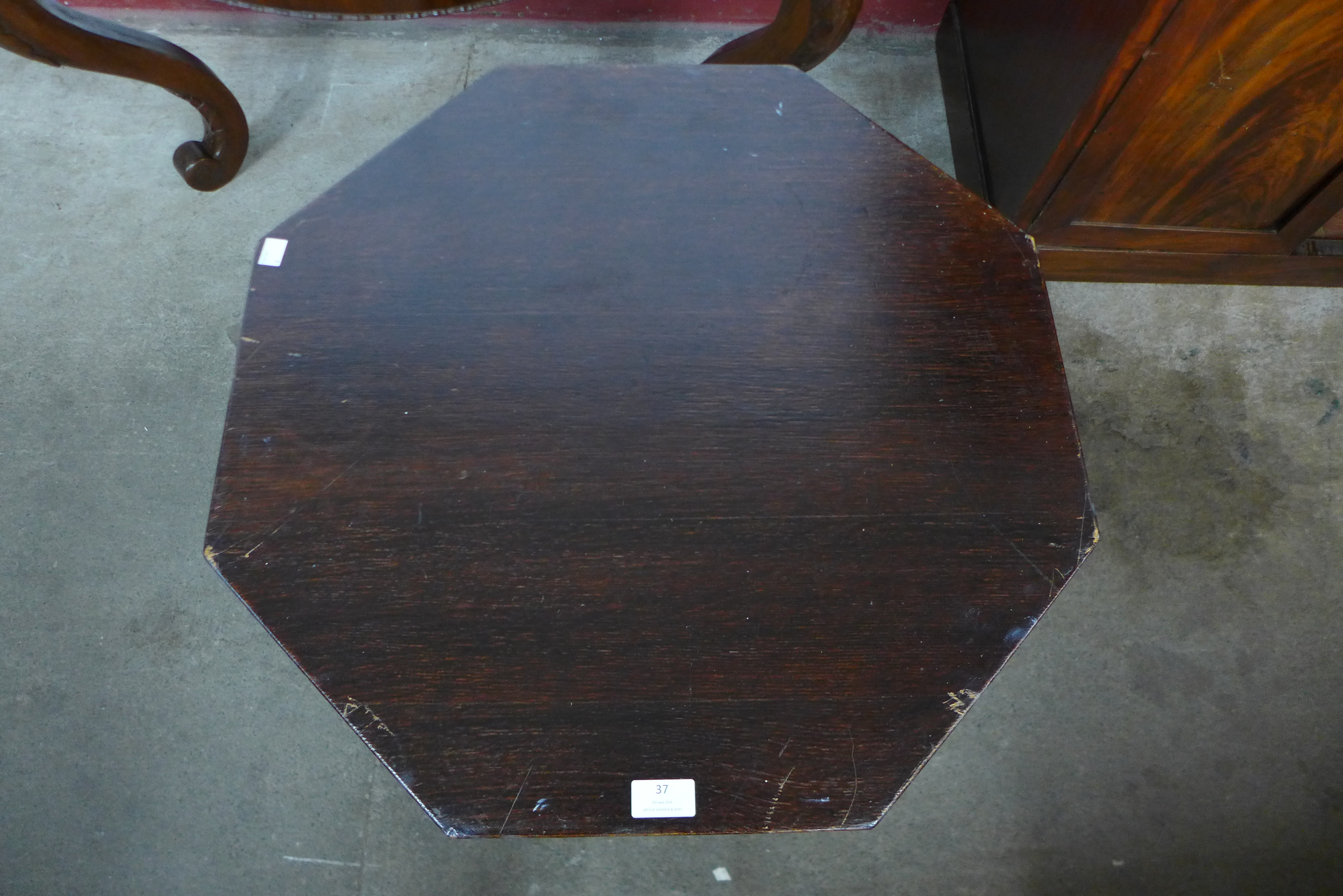 An Arts and Crafts oak octagonal occasional table - Image 2 of 2