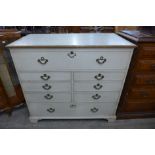 A George III painted oak chest of drawers, with lift up top