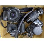 Three cameras; Canon, Nikon and Minolta, EOS 5000, F-401 and X-9, with three lenses, Sigma Zoom II