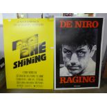 Film posters on board; The Shining Jack Nicholson and Raging Bull Robert de Niro