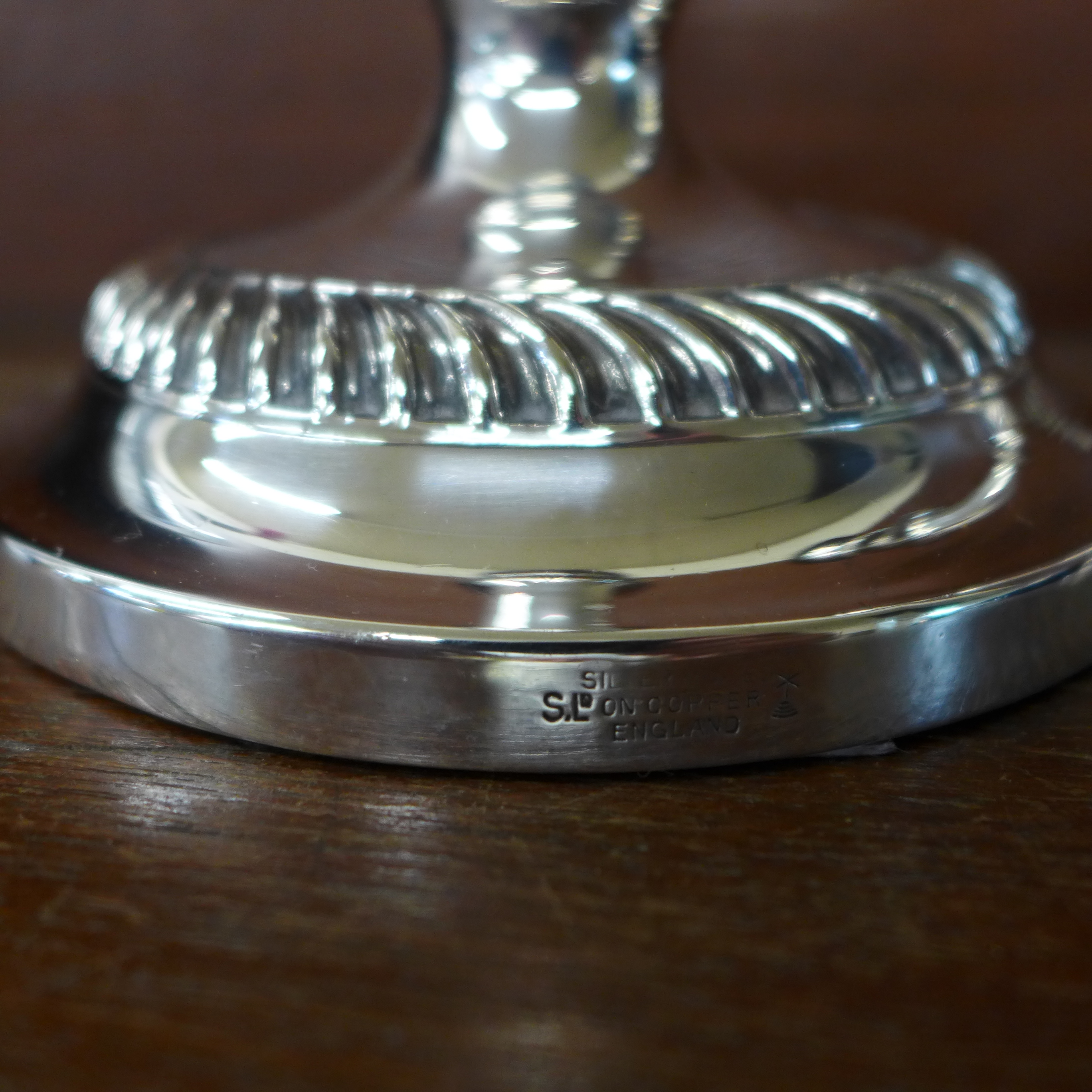 A pair of silver plate on copper candlesticks by William Suckling & Son, Birmingham, 21cm - Image 4 of 4