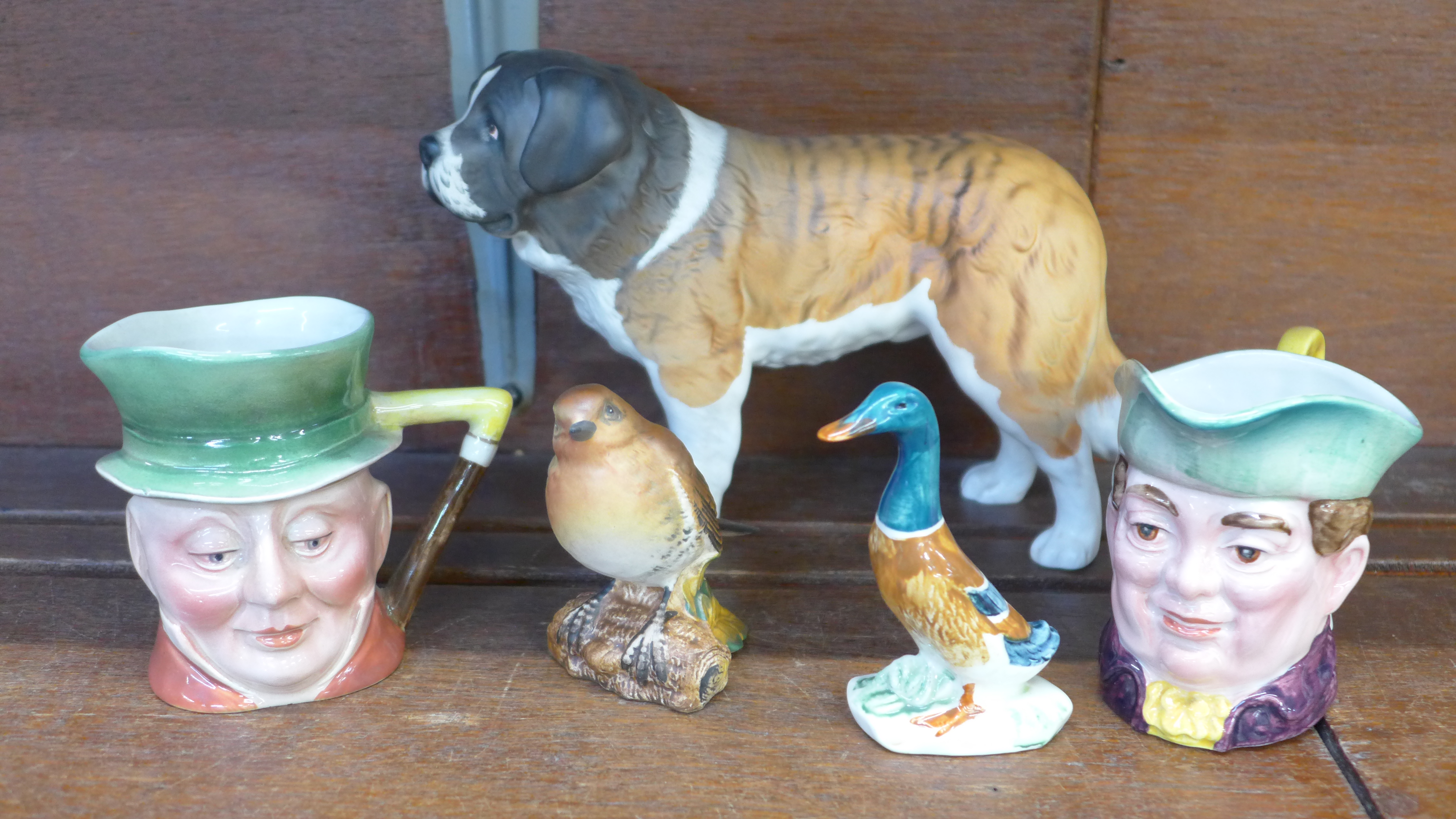 Five items of Beswick;- Saint Bernard, two character jugs, a Robin and a Mallard duck