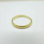 An 18ct gold ring, 2.7g, T, bears inscription