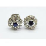 A pair of 9ct white gold cluster earrings, 1.9g