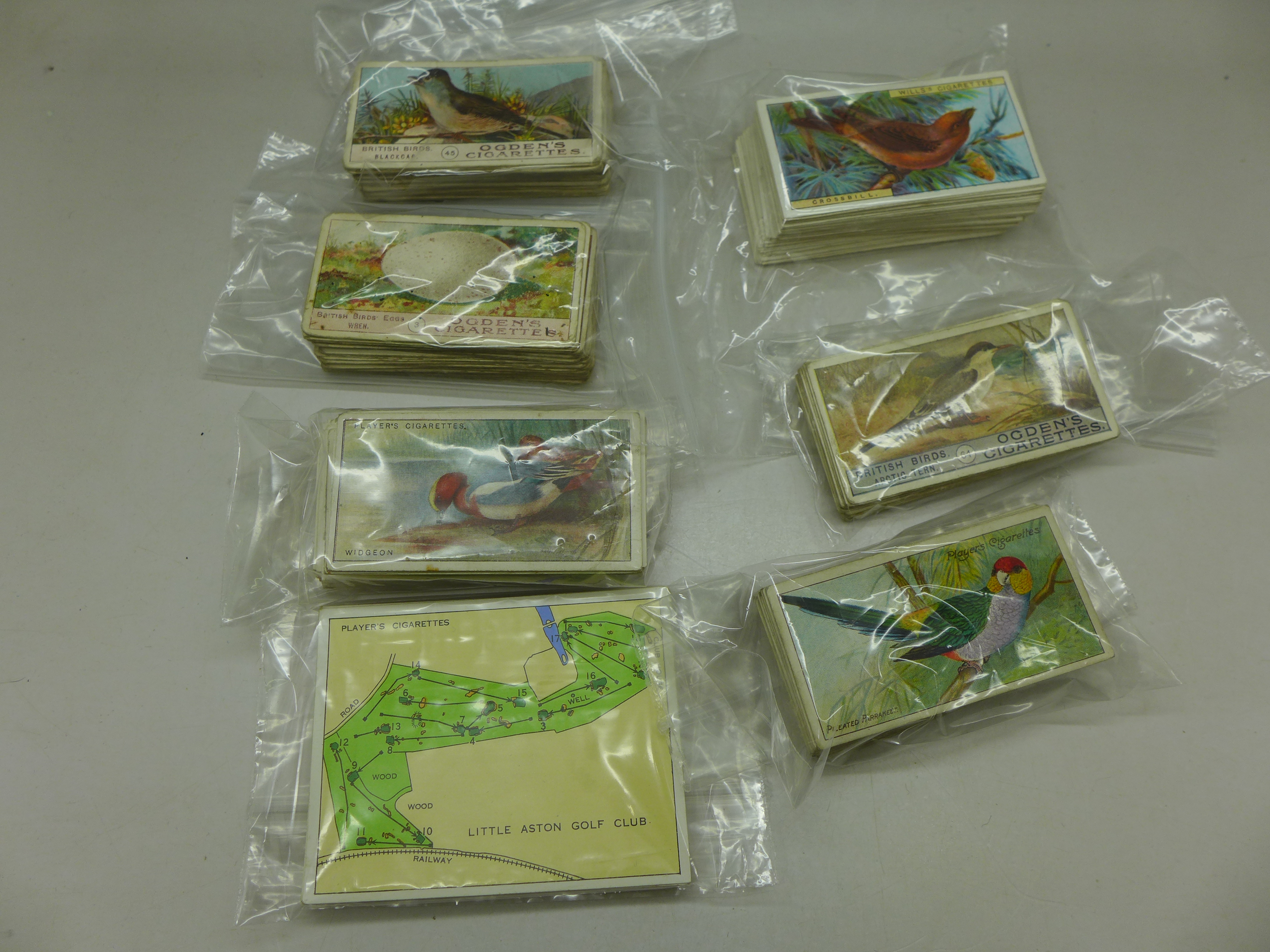 A collection of cigarette cards including Ogdens Bird's Eggs, British Birds, Game Birds and Wild