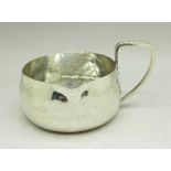 A hammered silver Arts and Crafts jug, Chester 1904, Haseler Brothers, 53g
