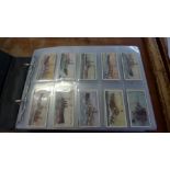 Cigarette cards; fifteen complete sets in album, Wills World Dreadnoughts, Engineering Wonders,