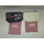 Two Radley clutch bags, with dust bags