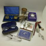 An Edinburgh Crystal clock, silver plated items, a novelty desk top fly vesta box, vintage