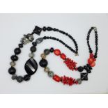 Two necklaces, one set with coral