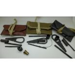 Three small gun related cases with multi-tool and nipple key, also a single brass ramrod end