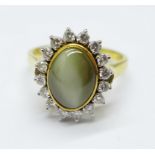 An 18ct gold, 'cats eye' and diamond cluster ring, 5.9g, Q