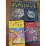 Three Harry Potter first edition books and a Harry Potter paperback book
