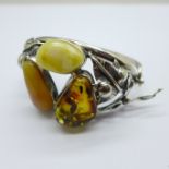 A 925 silver and Baltic amber set bangle, 53g