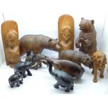 Four Black Forest carved wooden bears, a/f, and other tourist carvings