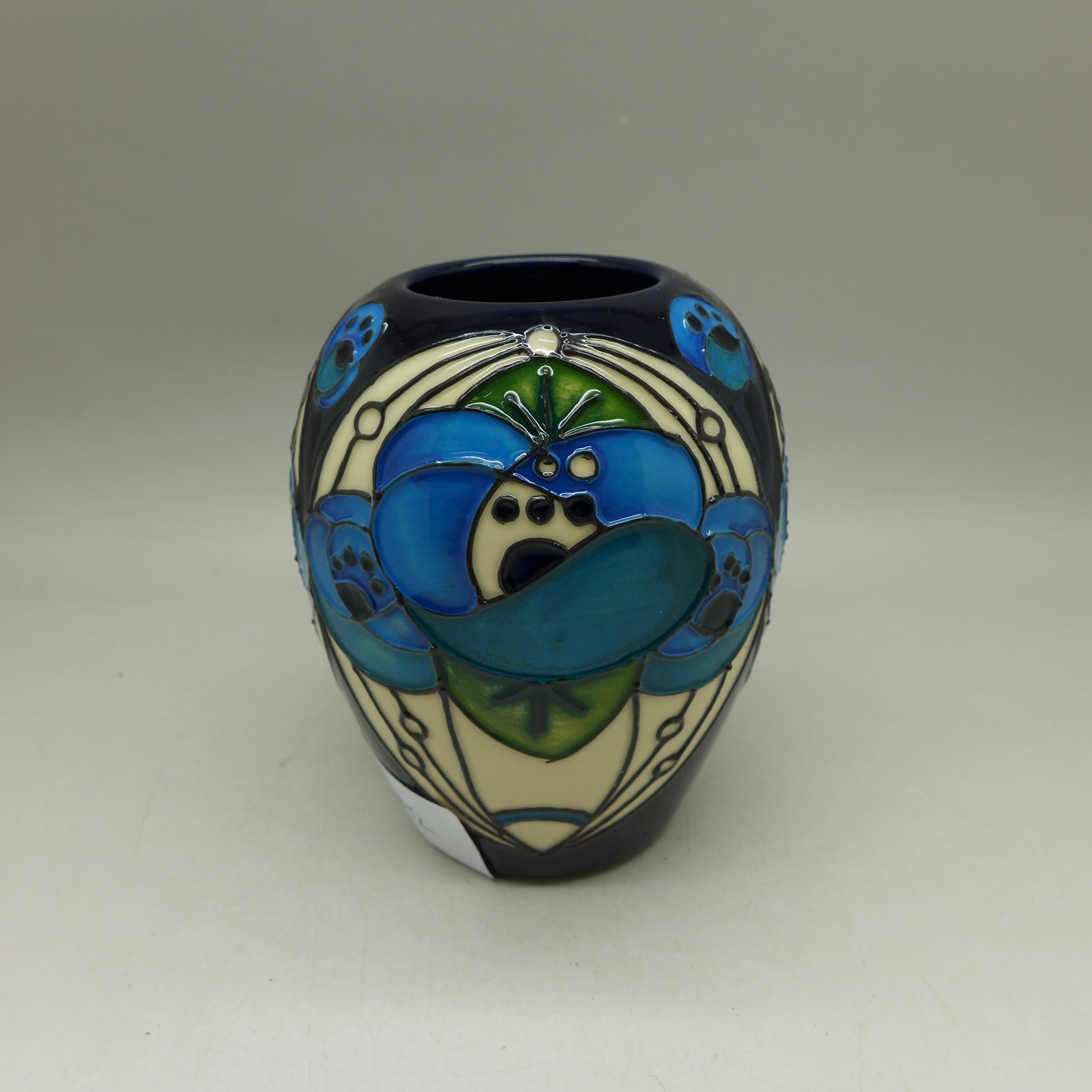 A Moorcroft Rennie Roseblue pattern vase, 9cm