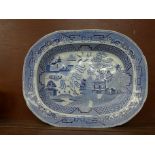 A Staffordshire blue and white Willow pattern serving plate