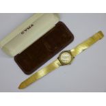 A Cyma Cymaflex 9ct gold wristwatch on a plated strap, with box, 32mm case, hallmarked London 1954