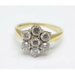 An 18ct gold, diamond cluster ring, approximately 0.90carat diamond weight, 3.9g, M