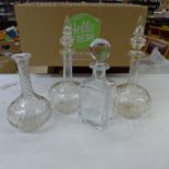 Four cut glass decanters