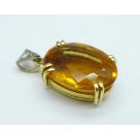 A yellow metal and citrine pendant, stamped 750, 3.2g