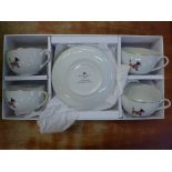 A set of four Radley cups and saucers celebrating The British Summer of 2012, boxed