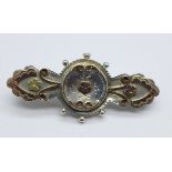 A Victorian silver and gold applied brooch