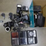 Cameras and equipment, an Agfa Isolette, a folding camera, light meter, Kodak Brownie and an