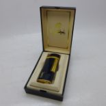 A Yves Saint Laurent lighter, losses to enamel