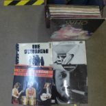 A collection of twenty-seven LP records, The Who, Yes, Pentangle, The Beatles, David Bowie, The