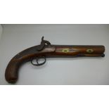 A large overcoat flintlock pistol, marked London, with lion mask butt cap