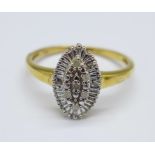 A silver gilt, marquise shape twelve diamond ring, S