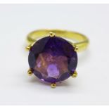 A silver gilt and amethyst solitaire ring, N