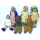 A group of six Norah Wellings dolls, including three with glass eyes, one black doll, 33cm to 36cm