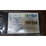 An album of forty-five stamp first day covers, envelope postal history, Buckingham Palace, House
