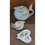 A Franz Porcelain teapot and cream jug, and a Graff Porcelain lidded pot