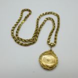 A 9ct gold chain, 17.7g, with a yellow metal locket