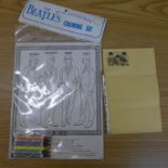 A The Beatles coloring set and a Beatles pencil and promotion sheet