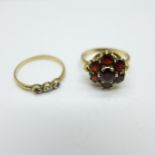 Two 9ct gold rings;- garnet cluster, and diamond and ruby set, 4.2g, both M