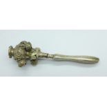 A Victorian silver baby's rattle with bells, on a later applied silver handle, a/f