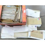 A large collection of used stamped and addressed envelopes