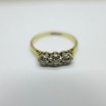 An 18ct gold and diamond trilogy ring, 2.7g, P