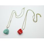 A silver mounted turquoise pendant and chain, and a silver mounted coral pendant and chain