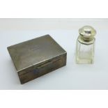 A silver box, width 8.5cm, personalised, and a silver topped bottle