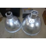 A set of three industrial aluminium light shades